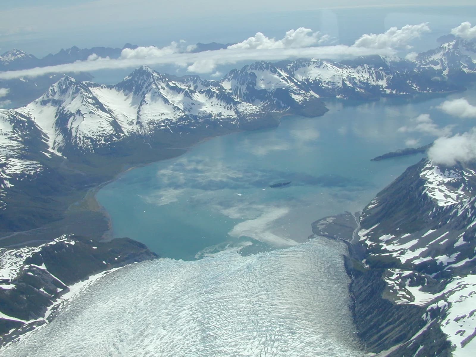 Glacial ice threading between the mountains of Kenai Fjords